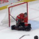 Petr Mrazek #34 makes a save using Taylor Halls stick during the Chicago Blackhawks matchup with the Minnesota Wild.